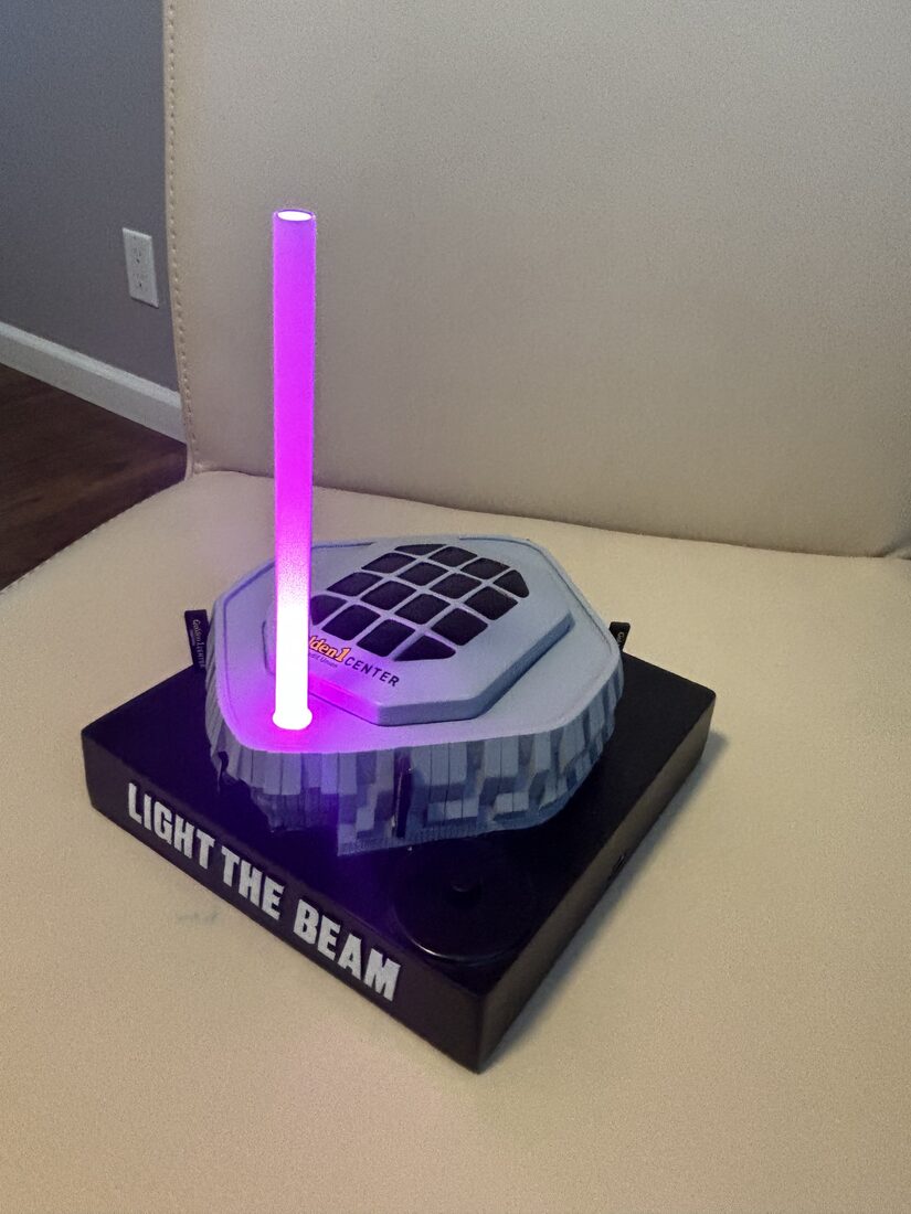 The arena replica with the Light the Beam element lit